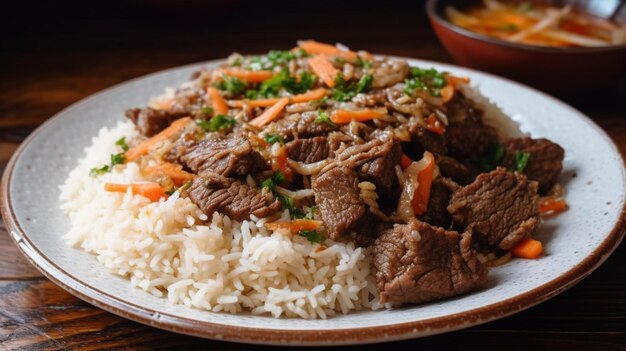 Fotografía de carne con arroz y zanahoria